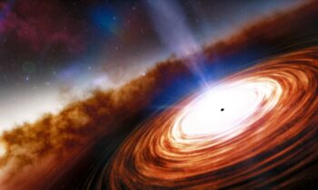 A giant black hole that is waking up is responsible for the mysterious brightening of distant galaxies